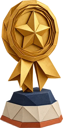 Gold origami medal rosette with ribbon tails on a navy and ivory paper pedestal